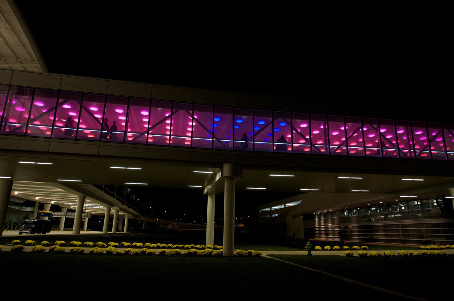 Outside photo of red and blue LED lights at Indianapolis airport